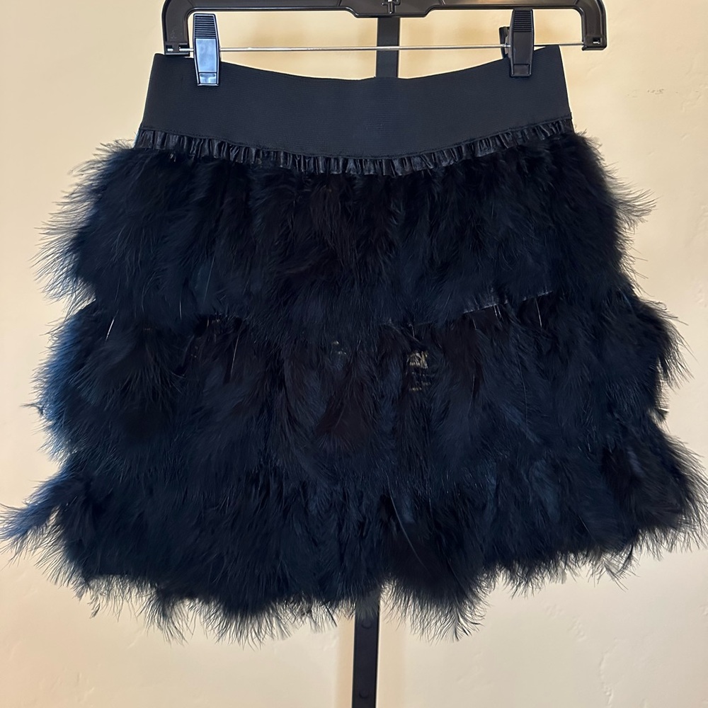 Black feather 3 tier mini skirt with elastic waist and polyester lining Size S/M